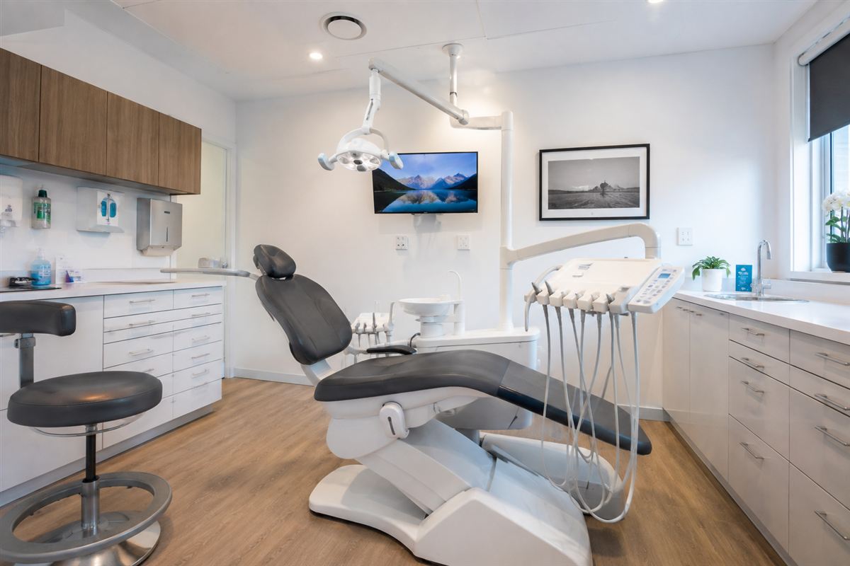 Modern dental treatment room with clean, current equipment