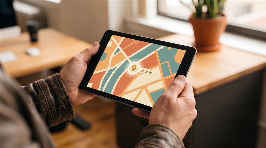 A person checking a local business's map listing and star rating on a tablet