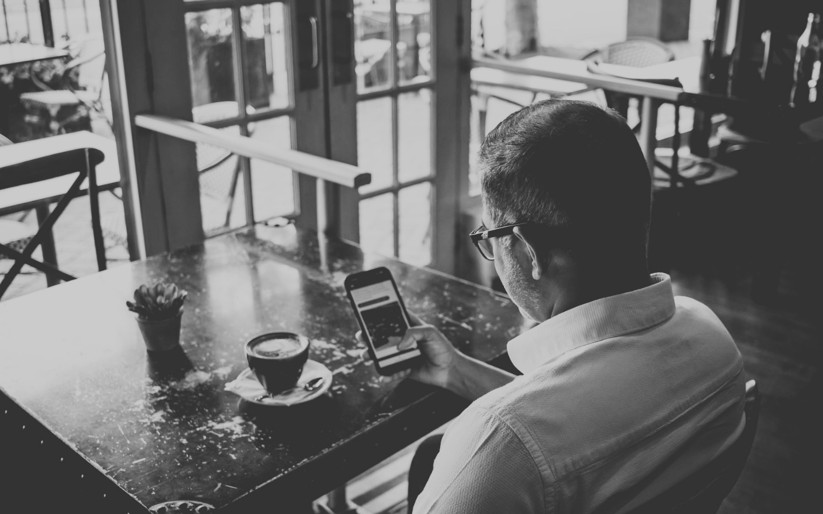 Checking social media performance from a Hornsby cafe